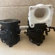 image0-1.jpeg js550 piston port dual carbs intake manifold