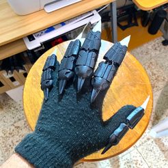 WhatsApp-Image-2023-03-19-at-6.44.42-PM.jpeg STL file Black panther claws Fixed・Design to download and 3D print