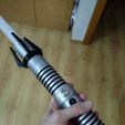 851cb95ebffa620bfd2b6f61e9673faa_display_large.jpg Lightsaber with lights and sounds