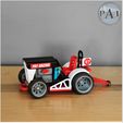 REAL001.jpg Tractor/Lawnmower dragster with functionnal steering!!