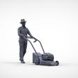 Man-with-LM.2.10.jpg Guy with Lawnmower gardener or construction worker