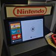 arcade-cabinet-switch3.jpg Nintendo Swtich Arcade stand with light up marquee.