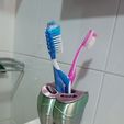 photo_2023-01-05_06-29-58.jpg Cute tooth-shaped toothbrush holder