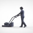 Man-with-LM.2.3.jpg Guy with Lawnmower gardener or construction worker