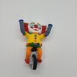 clown2.jpg Clown on Unicycle