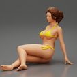 3DG-0006.jpg Femme sexy assise en bikini sur la plage
