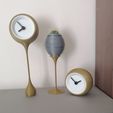1.3.jpg Standing spherical clocks