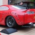 IMG_4027.jpg Toyota Supra 1:10 scale with wide body kit
