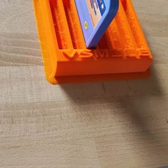344214582_1583141578850967_1415454783916665369_n.jpg Fichier STL Rack Cartouche console Vsmile・Objet imprimable en 3D à télécharger