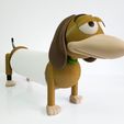 slinky-toy-story.jpg Slinky paper towel holder