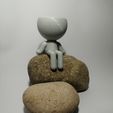 sitting-3.jpg Robert Plant Pot Sitting on Tree