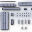 8. parts for one side.JPG deadshot full auto handgun movie prop (assembly model)