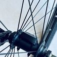 n.jpg BikeTag Stealth™ – Hidden AirTag Bike Mount – Wheel Hub STL File