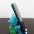 WhatsApp-Image-2024-12-24-at-10.31.48-AM.jpeg BULBASAUR - SUPPORTO PER CELLULARE A FORMA DI POKEMON