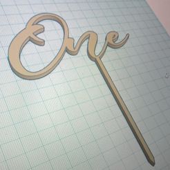 One.jpg Bouchon de gâteau Un