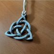 0c1f0f8ab7d14f18c75960392aae5fea_preview_featured.jpg Triquetra with prisoner ring