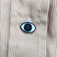 P20123-195856-1.jpg Eye-shaped button