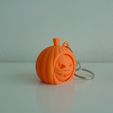 DSC01187.jpg spining face pumpkin keychain