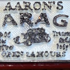 Aaron's Garage Schild