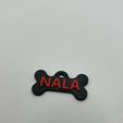 photo_6012433651935070240_y.jpg Dog tag NALA
