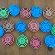 alphabet-spinners.jpeg Spinning Alphabet Pack STL (A–Z) – Print-in-Place Letter Keychains / Educational Fidget Letters