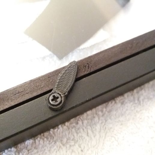 Fixed frame, hangs under glass