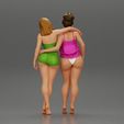 3DG-0004.jpg Two girl in bikini hugging on the beach