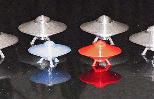 alien-invasion_display_large.jpg UFO with Spinning Outer Disk