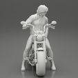3DG-0008.jpg Young man sitting on his motorbike - Separated and non separated