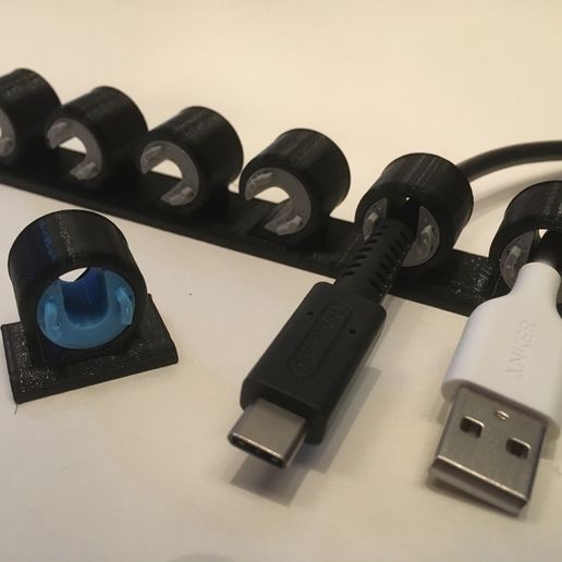 IMG-3889.JPG Archivo STL Organizador/soporte de cables - Organiza tus cables de carga con estilo・Plan para descargar y imprimir en 3D, yozz
