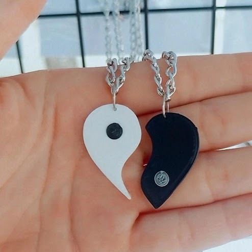 IMG_20250410_110827_767.jpg shared yin-yang heart charms
