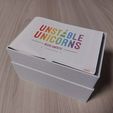 fe30beb1-f196-4c97-9a95-5b8b69f08196.jpg Unstable Unicorns box (all expansion with original lid)