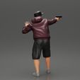 3DG1-0003.jpg gangster man in a hoodie and cap shooting a gun behind the car