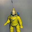 9983aace-f1d1-4adf-92c9-1a9b7b1f50e3.jpg tintin with lunar diving suit on the sea of ice landing on the moon