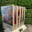 280520457_1394833474367010_2968196421250294037_n.jpg NINTENDO WII GAMES CASES HOLDER