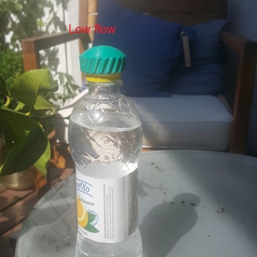 20180722_123517.jpg Soda bottle watering cap
