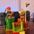 WhatsApp_Image_2021-09-17_at_10.11.28_AM_1.jpeg Nintendo Switch Pro Controller Charging & Amiibo Dock holder Mario theme with star