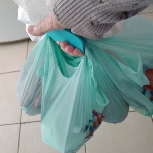 939fa073-00d8-496e-ba46-344217b7d8d9.jpg Bag Holder