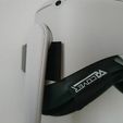 133566144_202078001567875_8048995871464703488_n.jpg Suporte de parede Quest 2 (compatível com a cobertura VR)