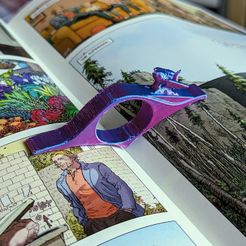 PXL_20230712_183507692~2.jpg Ouvre-livre bébé dragon