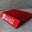 4b4967dcb95465c3fbd479574ad770e1_display_large.jpg Nintendo Switch Game Case Holder