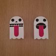 1000028037.jpg skeleton and ghost figet toy