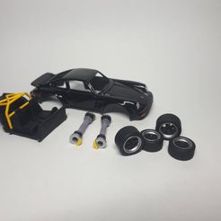 20211212_000027.jpg Porsche Fuchs Wheels 1:64 with axles, brake discs, roll cage and mirrors