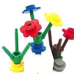 f9c59f6730d569a0dcf9be307d384542_preview_featured.jpg Free STL file Big flower heads LEGO Style - fully playable (with bouquet stem)・Object to download and to 3D print