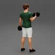 Girl-0004.jpg Muscular man working out in gym doing exercises with dumbbells at biceps