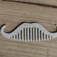 It's-a-comb-shaped-like-a-mustache-Printed.jpg Mustache comb logo