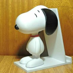 320848788_2000078926868878_5845884793635984639_n.jpg STL file Snoopy cell phone base・3D printing idea to download