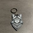 Image-2026-06-10T035121.285.jpg geometric cat keychain