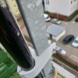 photo1645188967.jpeg Fishing pole vertical antenna to balcony railing clamp.