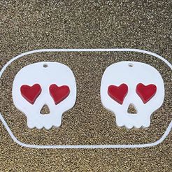 298076455_814551526624506_3042855994641275359_n.jpg STL file Halloween 2022 skull with heart eyes pendant | earrings | jewelry・3D printer design to download, tmakeroo